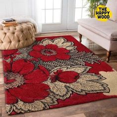 a red rug with flowers on it in a living room