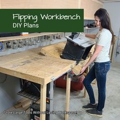 a woman working on a workbench with tools