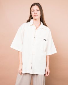 [lowkey trendsetter vibes]Vintage oversized cream starched MAZDA button up•Short sleeves•Button-up•Oversized fit•Starched and perfectly stiffLABEL: New Polo by Publi MunuoCONDITION: Vintage / ExcellentSIZE: oversized S/MModel is 5'10'' and a size S. Please make sure to double check your measurements with the ones listed in the tab below. Megan Walker, Vintage Guide, Perfect Coat, Short Sleeve Button Up, Corduroy Pants, Shoulder Sleeve, Trend Setter, Piece Of Clothing, Make Sure