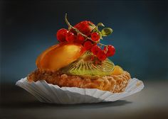 a piece of cake with fruit on top is shown in this still - life photo