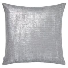 a silver pillow on a white background