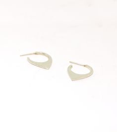 This pair of hoops are made from sterling silver and they come with butterfly ear backs. They are 20 mm long and 15 mm wide. If your ears can handle a bigger gauge I can make this pair a sleeper one without the need to have an ear back. If you prefer it smaller, have a look here: https://www.etsy.com/listing/628994062/small-hoops-sterling-silver-geometric?ref=shop_home_active_9&crt=1 Each pair is handmade to order and may slightly vary from the pictures. Please allow for subtle variations ma Minimalist Teardrop Hoop Earrings With Polished Finish, Modern Small Hoop Cartilage Earrings Tarnish Resistant, Small Hoop Sterling Silver Cartilage Earrings Tarnish Resistant, Tarnish Resistant Small Hoop Sterling Silver Cartilage Earrings, Tarnish Resistant Sterling Silver Small Hoop Cartilage Earrings, Modern Sterling Silver Huggie Earrings For Everyday, Minimalist Sterling Silver Small Hoop Huggie Earrings, Modern Everyday Huggie Earrings, Modern Sterling Silver Teardrop Huggie Earrings