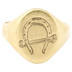 This is a lovable equestrian lover signet ring engraved with a horseshoe and a riding crop. It is a pinky ring , size 5 can be worn on the ring finger or but can be enlarged if wished. The engraving is crisp. The face measures 13.2mmx11mm. Wear it with other rings on the same hand be they silver or gold. So sweet. All one continuous piece of smooth gold Weight 5.8 grams Classic Horseshoe Jewelry, Riding Crop, Pinky Ring, Ring Finger, Engraved Rings, Signet Ring, Equestrian, The Ring, Jewelry Rings