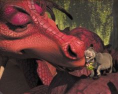 an image of a dragon and sheep in front of a red background with the caption zautanie