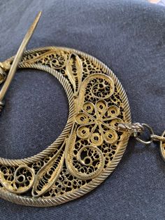 Antique Filigree Pair Gilded Sterling Hamza Fibula Bedouin - Etsy Traditional Yellow Gold Pendant Brooches, Traditional Formal Jewelry With Historical Design, Traditional Jewelry With Historical Design For Collectors, Traditional Collectible Jewelry Brooch, Traditional Formal Brooch With Intricate Design, Traditional Ceremonial Brooch Jewelry, Ornate Brooches With Intricate Design For Ceremonial Use, Handmade Antique Crescent Jewelry, Handmade Crescent Antique Jewelry