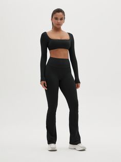 The Zoey Long Sleeve Active Crop Top seamlessly combines style and comfort, making it an essential piece for your activewear wardrobe. This top is designed to offer support and freedom of movement, perfect for any workout or casual outing. Fit and Features: Fitted design provides excellent support and a flattering fit. Long sleeves with thumbholes ensure a secure and comfortable fit during activities. Buttery soft fabric feels like a second skin for ultimate comfort. Four-way stretch material en Long Sleeve Activewear For Workout, Functional Activewear With Thumbholes, Fitted Sportswear Tops With Light Support, Casual Long Sleeve Activewear In Elastane, Athleisure Activewear With Thumbholes, Versatile Activewear With Thumbholes, Versatile Solid Activewear With Thumbholes, Compressive Elastane Activewear With Thumbholes, Athleisure Activewear With Thumbholes And Elastane