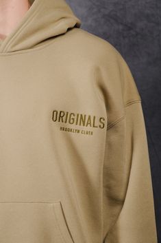 Introducing the Originals Tonal Embroidered Hoodie, part of the Originals Collection. The relaxed fit and ribbed cuffs provide a comfortable and secure fit. The embroidered Originals Logo placement on the front chest adds the right details. The fit is meant to be oversized with a relaxed body and sleeves. Style: BHMH154F Oversized Hoodie Design, Logo Placement, Sleeves Style, Embroidered Hoodie, Jogger Shorts, Oversized Hoodie, Mens Outerwear, Oversize Hoodie, Hoodie Top