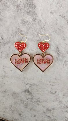 "Darling Double Heart Enamel and Resin Valentines Earrings ( 1 3/4\"H ) * Gifts for Her * Love Earrings * Cupid * Teachers Gifts * Trending" Cute Heart Earrings For Valentine's Day Wedding, Cute Heart Earrings For Wedding On Valentine's Day, Valentine's Day Heart Charm Enamel Earrings, Valentine's Day Gold Heart Enamel Earrings, Gold Enamel Heart Earrings For Valentine's Day, Cute Wedding Earrings For Valentine's Day, Gold Enamel Earrings For Valentine's Day, Valentine's Day Nickel-free Metal Heart Earrings, Nickel-free Metal Heart Earrings For Valentine's Day