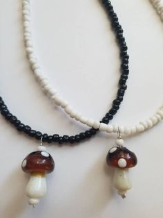 Super cute beaded mushroom necklaces! Perfect for yourself or a friend. :) Both are about 15 inches long made with an adjustable clasp so you can make them a little longer. If you need a different size just checkout and leave me a note in your order of what size you need.  :) Shipping info: Your item will be shipped 1-2 business days after you placed your order. Tracking is always included unless noted otherwise. Mushroom Necklace Bead, Mushroom Pearl Necklace, Light Blue Bead Necklace Mushroom, Mushroom Necklaces, Beaded Mushroom, Jewelry Mushroom, Necklaces Beaded, Mushroom Necklace, For Her Gifts