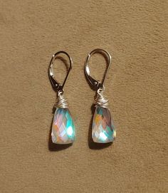 Rainbow quartz earrings dangle approx 1 inch from lobe. Elegant yet sweet these have amazing clarity and cut. Elegant earrings. Matching necklace available as well. Checkout my other (longer) moonstone quartz earrings here: https://www.etsy.com/listing/694597484/long-rainbow-moonstone-quartz-earrings Gold filled Rose gold filled Sterling silver Hypoallergenic Sterling Silver Iridescent Jewelry, Hypoallergenic Iridescent Sterling Silver Jewelry, Iridescent Drop Earrings For Jewelry Making, Iridescent Teardrop Jewelry For Gift, Iridescent Hypoallergenic Jewelry As Gift, Iridescent Sterling Silver Earrings For Pierced Ears, Iridescent Sterling Silver Dangle Earrings, Iridescent Drop Earrings With Matching Jewelry, Iridescent Sterling Silver Pierced Earrings