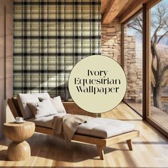 a living room with wood flooring and plaid wallpaper on the walls next to a chaise lounge