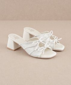 The Emerald | White Double Bow Peep Hole Sandal – Oasis Society White Formal Shoes, Unique Bridal Shoes, Cute White Sandals, Wedding Shoes Vintage, Emerald Blue, Double Bow, Stunning Shoes, Wrap Heels, Shoe Inspo