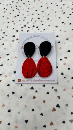 Handmade red and black pattern polymer clay statement earrings. All of my earrings are made out of polymer clay and using 925 sterling silver findings. My polymer clay earrings are handmade in United Kingdom; Please bear in mind that the earrings that you will receive may differ slightly from the image and there may be minor imperfections in each piece. That is why you are going to receive and have a modern, different and unique pair of earrings! Colours on computers monitors and screens may vary; so if you have any questions about these earrings, please send me a message prior to purchase and I will be honoured to give you the most detailed description I can. All the items will be posted in a large letter box and send via Royal Mail 1st Class; and if you order comes from UK it will be fre Hand Painted Red Polymer Clay Earrings, Red Hand Painted Polymer Clay Earrings, Red Drop Earrings In Polymer Clay, Trendy Red Hand Painted Earrings, Handmade Red Polymer Clay Earrings, Red Polymer Clay Dangle Jewelry, Everyday Red Polymer Clay Jewelry, Red Polymer Clay Drop Earrings, Elegant Red Polymer Clay Earrings