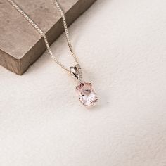 The "Roslyn" pendant is a beautiful piece to pair with our "Roslyn" morganite ring to create a gorgeous set. The softness of the pink morganite and the diamond accents make this a perfect gift for various occasions, whether it's an anniversary, birthday, or Mother's Day gift. Pendant Details: Primary Stone Type: Natural Pink Morganite Stone Size: 8x6mm Oval Cut Total Diamond Carat Weight: 0.03 CTW Available in: 14K white gold or 14K Rose gold Please note that the chain is not included- This is a pendant ONLY listing. ***These pendants have a 4 week lead time. If you need your pendant sooner than that, please contact us prior to ordering to verify if that's possible.*** | "Roslyn" - Oval Morganite & Diamond Accents Pendant Ring - by Staghead Designs - 14K White Gold - Men's Classic White Gold Morganite Jewelry, Timeless Rose Gold Oval Pendant Jewelry, Timeless Morganite Rose Gold Jewelry, Timeless Rose Gold Morganite Jewelry, Oval Pendant Jewelry With Prong Setting As Gift, Oval Pendant With Diamond Cut For Gift, Oval Diamond Cut Pendant Jewelry For Gift, Oval Rose Gold Jewelry With Birthstone, Gift Diamond Cut Oval Pendant Jewelry