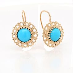 Gold Turquoise Earrings Wire Back Drop Gemstone Blue Stone Antique Reproduction Antique reproduction with twisted wire work set with a cabochon turquoise (Approx. 1.6cttw, 9mm x 9mm) and wire back gold. Earrings are 15mm tall and 15mm wide (6/10 x 6/10 inch) and made of 14k yellow gold. PROUDLY MADE FROM SCRATCH IN NEW YORK CITY. SKU: E233MA Our Pledge: 1. All items to be BRAND NEW and authentic. 2. All gemstones to be 100% genuine and mined from the earth. 3. Jewelry guaranteed to be solid 14kt Yellow Gold Cabochon Round Earrings, Yellow Gold Cabochon Earrings, Yellow Gold Round Cabochon Earrings, Turquoise Cabochon Drop Earrings, Fine Jewelry Drop Earrings With Cabochon, Fine Jewelry Cabochon Drop Earrings, Formal Turquoise Oval Earrings, Elegant Turquoise Gemstone Earrings, Elegant Cabochon Earrings