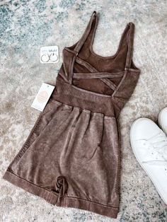 Achieve a seamless athleisure look with this Mineral Washed Romper. Its scoop neckline and contoured design create a flattering silhouette, while the crisscross straps provide a modern touch. The Mineral Wash adds a unique color variation to the fabric for a unique, eye-catching look. Activewear Knit Mineral Wash Super Stretchy Scoop Neckline Crisscross Back Straps Seamless Fitted Silhouette 90% Nylon, 10% Spandex True to Size Fit Guide: SUPER stretchy fit - S/M can fit up to a true size large, Sporty Seamless Cross Back Activewear, Casual Fitted Sports Bra Made Of Seamless Fabric, Summer Seamless Cross Back Activewear, Seamless Crisscross Activewear For Workout, Seamless Crisscross Workout Activewear, Sporty Scoop Neck Sports Bra For Loungewear, Casual Seamless Sports Bra With Cross Back, Athleisure Seamless Activewear With Cross Back, Fitted Scoop Neck Activewear For Loungewear