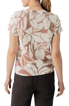 Jazz up your laid-back look with a cotton-first top covered in a groovy print. 24" length (size Medium) Crewneck Short sleeves 51% cotton, 49% rayon Machine wash, dry flat Imported Cotton T-shirt With All Over Print For Vacation, Patterned Floral Print Cotton T-shirt, Trendy Printed Cotton Tops, Casual V-neck Top With All Over Print, Relaxed Fit Cotton Tops With Abstract Print, Casual Cotton Tops With Abstract Print And Relaxed Fit, Printed Cotton Crew Neck Top, Cotton V-neck Top With All Over Print, Patterned Crew Neck Top For Vacation