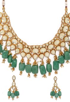 This is Beautiful Clear Golden Kundan Choker Necklace with Earrings. Its Statement Choker which gives a royal look like queen. Bring your style to a whole new level with this handcrafted piece of jewellery. When you're celebrating a special occasion - a birthday, wedding, or personal milestone - this piece adds that extra something that makes us feel special and looking our best. Its earrings size is about 3 inches including Hangings of Emerald Green beads. Please feel free to write us if you wa Traditional Necklace With Mirror Work For Reception, Traditional Mirror Work Necklace For Reception, Traditional Jewelry With Mirror Work For Reception, Traditional Mirror Work Jewelry For Reception, Traditional Bridal Necklace With Mirror Work For Reception, Handmade Kundan Necklace For Reception And Festivals, Mirror Work Jewelry For Reception At Diwali, Traditional Handmade Jewelry For Reception, Traditional Jewelry Sets For Receptions And Festivals