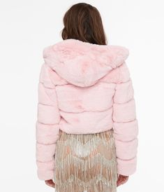 This trendy jacket features a stylish cropped design that's perfect for pairing with high-waisted jeans or skirts. The luxurious faux fur lining adds an extra layer of warmth and comfort, while the hood keeps you protected from the elements.Available in sizes S-XL while supplies last.This is a Special Order item, please allow a 2-3 day handling time. Trendy Faux Fur Winter Outerwear, Fluffy Fur Coat For Cold Weather In Spring, Fluffy Fur Coat For Cold Weather, Trendy Fitted Faux Fur Coat, Fluffy Faux Fur Outerwear For Spring, Trendy Fitted Fur Coat With Faux Fur Trim, Spring Hooded Faux Fur Coat, Trendy Fluffy Fur Coat For Cold Weather, Trendy Fluffy Hooded Outerwear