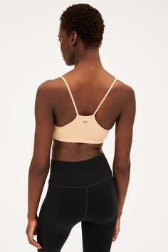 An easy to wear seamless bra designed to go from gym to everyday...seamlessly. Chafe-free fabric lets you move with easy and layers beautifully under any top. BEST FOR: running, yoga, crossfit, barre, pilates, spin class or gym workouts. Model is 5'10" and wears a size XS/S. Supportive Gym Bra With Built-in Support, Functional Compressive Crop Top With Built-in Bra, Yoga Crop Top With Built-in Bra And Medium Support, Yoga Crop Top With Built-in Bra, Micro-elastic Crop Top With Built-in Bra For Yoga, Compressive Seamless Sports Bra With Built-in Bra, Micro-elastic Workout Crop Top With Built-in Bra, Functional Crop Top With Built-in Bra For Pilates, Functional Yoga Sports Bra With Built-in Bra