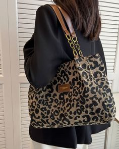 The unique leopard print design makes every detail full of charm, and it can be easily matched for both casual and formal occasions. This bag is not only a fashionable choice, but also a practical must-have item! FEATURES Fashionable leopard print design: unique leopard print pattern, adding a sense of fashion, versatile in various styles. One-shoulder design: easy to carry, suitable for daily travel. Underarm bag style: fits under the armpit, free hands, more convenient to use. High-quality fab Chic Large Capacity Leopard Print Bag, Trendy Leopard Print Tote Shoulder Bag, Casual Leopard Print Shoulder Bag With Zipper, Large Capacity Leopard Print Tote Shoulder Bag, Leopard Print Shoulder Bag With Animal Design, Trendy Leopard Print Shoulder Bag For Everyday Use, Trendy Leopard Print Shoulder Bag With Adjustable Strap, Chic Leopard Print Tote Shoulder Bag, Everyday Leopard Print Shoulder Bag With Animal Design