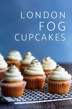 some cupcakes are sitting on a cooling rack with the words london fog cupcakes above them