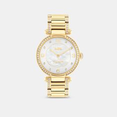 Timeless and elegant the Cary watch is a sophisticated style perfect for day or night. The gold tone bracelet design shimmers with crystals and features a luminous mother-of-pearl dial with our iconic Horse and Carriage motif for a heritage touch. | Coach Cary Watch, 34 Mm - Women's - Gold Horse And Carriage, Bracelet Design, Minerals Crystals, Sophisticated Style, Bracelet Designs, Quartz Movement, Accessories Watches, Quartz Crystal, The Gold