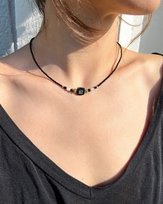 This boho necklaces are  the perfect accessory for any outfit!  It comes in two colors; Turquoise and Black. Both them is made with small beads, pearl and gold spacers. It has an extension chain allowing for easy adjustability and remove.  It is ready to ship immediately. Necklace Care: We do not recommend wearing in the shower to avoid tarnishing and prolong the life of your pieces! Necklace Length: 16.5 inch (with 1 inch extender to make the necklace adjustable to 17.5 inches) Handmade Necklace Closure: Lobster Claw  Adjustable length Adjustable Bohemian Beaded Necklace With Black Beads, Bohemian Adjustable Beaded Necklace With Black Beads, Bohemian Black Beads Jewelry, Turquoise Beaded Necklaces With Black Beads For Festival, Black Bohemian Beaded Necklaces With Tiny Beads, Bohemian Adjustable Faceted Beads Choker, Bohemian Black Beads Choker Necklace, Bohemian Faceted Beads Choker, Bohemian Crystal Necklaces With Tiny Beads For Gifts