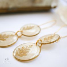 Minimalist Gold Leaf Earrings, Elegant Brass Leaf Jewelry, Nature-inspired Nickel-free Gold Earrings, Nature-inspired Gold Earrings With Ear Wire, Nature-inspired Gold Nickel-free Earrings, Nature-inspired Gold Jewelry With Matching Earrings, Hypoallergenic Gold Nature-inspired Jewelry, Nature-inspired Gold Earrings, Nature-inspired Hypoallergenic Gold Jewelry