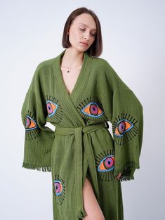 Introducing our exquisite organic cotton Handmade Evil Eye Boho Festival Kimono, a mesmerizing blend of bohemian elegance and spiritual symbolism. Handcrafted with love and care, this kimono is a stunning addition to your festival wardrobe, offering both style and positive energy. Our bohemian kimono, which is made of 100% handmade high quality cotton fabric, can be used as a pareo in daily life or on the beach. (Made in Turkey) All of our ultra soft products are OEKO-TEX Standard 100 Certified. Festival Kimono, Handmade Evil Eye, Bohemian Kimono, Eye Print, Cover Beachwear, Boho Kimono, Boho Green, Kimono Cardigan, Womens Robes