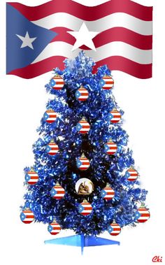 a blue christmas tree with red, white and blue ornaments in front of an american flag