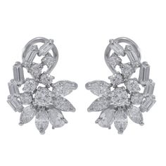 Platinum Pear-shaped Diamond Earrings For Formal Occasions, Formal Pear-shaped Platinum Earrings, Luxury Pear-shaped Cluster Earrings For Formal Occasions, Luxury Pear-shaped Cluster Earrings For Formal Events, Luxury Marquise Diamond Earrings For Formal Occasions, Brilliant Cut Marquise Diamond Earrings For Formal Occasions, Formal Marquise Diamond Cut Cluster Earrings, Dazzling Marquise Diamond Earrings For Formal Events, Formal Marquise Cluster Earrings With Brilliant Cut