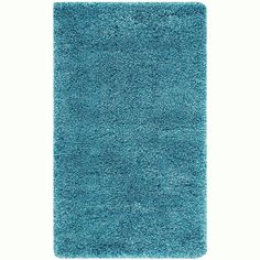 a blue rug on a white background