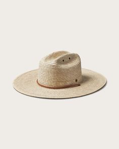 Born from earth and hand woven by artisans. The Monterrey is a medium depth cattleman crown with an oversized brim treated with light stiffness for flexible structure and shape. Directly from the earth alongside our artisan partners, Hemlock brings you handmade quality you can trust. Includes interior size adjuster and foam filler tape, so you can reduce the size of your hat by 1 - 2.5 cm and add comfort at the same time.  If in between sizes; order one size up. Sizing is based on head circumfer Woven Natural Hats For Ranch, Natural Woven Hats For Ranch, Flat Brim Natural Hat For Ranch, Wide Brim Woven Straw Hat For Ranch, Rustic Curved Brim Hat Bands In Natural Color, Rustic Hat Band For Curved Brim In Natural Color, Natural Straw Sun Hat For Ranch, Rustic Flat Brim Sun Hat For Outdoor, Curved Brim Woven Straw Hat For Ranch