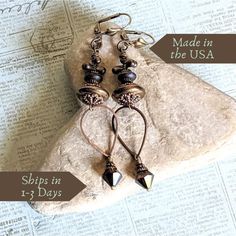 These Edwardian Earrings feature brown crystals in a whimsical, long steampunk design, ideal for dark academia style. With their elegant lever back, they make a unique handmade gift for your niece or sister-in-law. 𝗗𝗘𝗧𝗔𝗜𝗟𝗦 🍃 Earrings measure 2 and 1/2 inches from base of ear wires 🍃 Ear wires are made in the USA of lead/nickel free antiqued brass 🍃 Mixed metal includes brass and pewter in antiqued and copper plate 🍃 Tear drop hoops are able to rotate top to bottom 🍃 Vintage Czech glass beads in matte dark brown and metallic copper 🍃 Swarovski crystal in deep mocha brown 🍃 One of a kind gift; don't miss out! 𝗛𝗢𝗪 𝗧𝗢 𝗢𝗥𝗗𝗘𝗥 1: Select item quantity 2: Select options, if applicable 3: Add to cart 4: Choose shipping method 𝗬𝗢𝗨 𝗔𝗟𝗦𝗢 𝗠𝗜𝗚𝗛𝗧 𝗟𝗜𝗞𝗘 Lever Back Ear Edwardian Earrings, Gift For Sister In Law, Brown Crystals, Dark Academia Style, Steampunk Earrings, Academia Style, Copper Plate, Earring Ideas, Metallic Copper