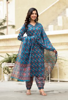 Grab this beautiful 3-piece set. The set comes with straight cut block print kurta has v neck, 3/4th sleeves & calf length teamed with matching bottom and a chanderi cotton dupatta to match. Color - Blue Kurta Fabric-Viscose Pant Fabric-Viscose Dupatta Fabric- Chanderi Cotton Neck-V Neck Sleeves-3/4th Sleeves Work - Block Print Detailing Washing Instructions-Dry Clean Model Height - 5.5 wearing size small. DISCLAIMER - The color of the product may be differ due to screen settings of device. A misprint here and a colour drop slip there is the beauty of printing which is not treated as a defect. Bohemian Chanderi Palazzo Set With Long Sleeves, Bohemian Long Sleeve Chanderi Palazzo Set, Festive Floral Print V-neck Palazzo Set, Festive V-neck Floral Print Palazzo Set, Festive V-neck Kurta With Block Print, Cotton V-neck Set With Dupatta, Eid Floral Print V-neck Kurta, V-neck Sets With Printed Motifs For Eid, Bohemian Long Sleeve Palazzo Set For Eid