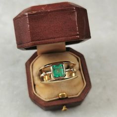 Estate 18k Emerald & Diamond Ring - marked 18k on inside back of band  - constructed of solid 18k yellow gold with genuine emerald and diamonds - an approx. 6.07 mm x 5.07 mm emerald cut emerald is bezel set at the centre of ring    - emerald weighs approx. 0.96ct    - stone has good clarity for an emerald, with 2 phase inclusions and fingerprints visible under high magnification    - Zambian emerald; high iron content = does not fluoresce     - vivid slightly bluish green  - ring consists of 3 Gia Certified Gold Rings For May Birthstone, Yellow Gold Emerald Cut Emerald Ring For Anniversary, Fine Jewelry Emerald Cut Yellow Gold Emerald Ring, Yellow Gold Emerald Ring As Gift, Gold Emerald Cut Emerald Birthstone Ring, Stamped 14k Emerald Cut Emerald Jewelry, 14k Stamped Emerald Anniversary Ring, Gold Emerald Cut Emerald Ring Birthstone, Gift Emerald Ring In Yellow Gold