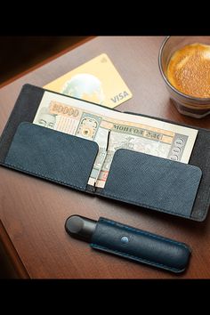 Genuine Leather Wallet with Cash Clip made by Maris True Leather, in Ulaanbaatar, Mongolia. Design: A total of six (6) card slots, 3 on each side. Made with cash insert and cash clip for fashionable yet compact design. Size (L: H): 4.5x 3.5 inches (closed)/ 8x 3.5 inches (opened) Trifold Card Holder With Coin Pocket For Travel, Foldable Bifold Wallets For Daily Use, Foldable Bifold Wallet For Daily Use, Compact Wallets With Rfid Blocking For Daily Use, Bifold Card Holder With Pen Slots For Everyday Use, Rfid Blocking Bifold Card Holder, Compact Travel Card Holder With Coin Pocket, Compact Rfid Blocking Wallets For Daily Use, Compact Trifold Wallet With Card Slots For Business