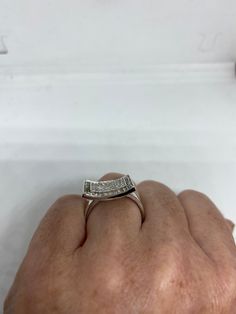 Vintage white sapphire ring Pave set 925 Sterling Silver Setting Size 8 Can be resized, my jeweler charges $10-$20 All rings are shipped free in the US in a nice gift box. Check out our over a THOUSAND great reviews Engraving is $4 per letter and is not always perfect depending on the piece. It can take a few days if the jeweler is busy. This is payable to Paypal Judithsltd@gmail.com White Bypass Ring With Prong Setting For Anniversary, Anniversary White Bypass Ring With Prong Setting, Formal White Bypass Ring With Diamond Accents, Diamond Open Ring Stamped 925 For Anniversary, Stamped 925 Open Diamond Ring For Anniversary, Stamped 925 Open Ring For Anniversary, Formal White Gold Bypass Ring With Vvs Clarity, Silver Diamond Bypass Ring, Silver Diamond Bypass Ring Fine Jewelry