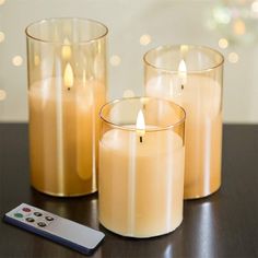 three eywamage gold glass flameless candles with a remote three eywamage gold glass flameless candles with a remote on a black table Earth Tone Bedding, Led Taper Candles, Flameless Candle Set, Fake Candles, Battery Candles, Pretty Candle, Led Pillar Candle, Traditional Candles, Flameless Led Candles