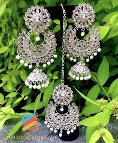 Silver Earrings with Jhumki and Tikka Set. 📦Unmatched FREE Worldwide Shipping EXPLORE more Maang Tikka Sets and Tikka Set Punjabi Match with our pretty Single Line Necklaces 💁🏻‍♀️Rupi, Canada ⭐️⭐️⭐️⭐️⭐️ Hi Kiran, I discovered your website on Friday. I was looking for some jewellery after spending a day in Brampton looking for something reasonable and elegant. Didn't find much so I went online and was surprised we had one in our own town. You need to make yourself more around Oakville. ⭐️⭐️⭐️⭐ Luxury Silver Chandbali Tikka, Luxury Silver Temple Jewelry Tikka, Luxury Silver Tikka In Temple Jewelry Style, Luxury Silver Tikka With Stone Work, Luxury Silver Tikka For Diwali, Luxury Silver Tikka For Festive Occasion, Luxury Silver Tikka For Festivals, Luxury Hand Set Silver Tikka, Luxury Hand-set Silver Tikka