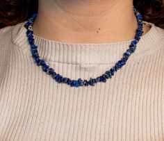 Add an element of zen to your life with your new lapis lazuli chip necklace. This stunning blue crystal necklace will set you apart like nothing else. What a stunningly beautiful, impressive gift to let that special someone know just how important they are to you. DETAILS Your new made to order raw lapis lazuli necklace will consist of natural lapis chip stone beads strung together into an 18 inch long necklace. METAPHYSICAL Lapis lazuli is the December birthstone, making it the perfect gift for Lapis Lazuli Crystal Necklaces For Jewelry Making, Lapis Lazuli Crystal Necklace For Jewelry Making, Adjustable Lapis Lazuli Crystal Necklaces With Gemstone, Lapis Lazuli Gemstone Crystal Necklaces For Jewelry Making, Lapis Lazuli Gemstone Necklace For Jewelry Making, Blue Lapis Lazuli Crystal Necklace For Gift, Blue Lapis Lazuli Crystal Necklace As A Gift, Blue Lapis Lazuli Crystal Necklace - Perfect Gift, Spiritual Lapis Lazuli Beaded Necklace Gift