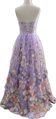 a purple dress with flowers on it