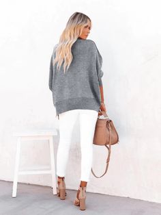 Update your knitwear collection with this oversized sweater boasting a relaxed silhouette and a smoke grey tone. Size Guide: Model is 5’6” tall, and has a 33.5” bust, 24.8”waist, & 37.4” hips. She is wearing a S / US 4 / AU 8. This sweater is true to size. Material: 100% acrylic. Care Instructions: Machine wash / Cold hand wash Knitwear Collection, Welcome Winter, Reindeer Headband, Grey Knit Sweater, Grey Tones, Daily Dress, Dress Jewelry, Cold Hands, Oversized Sweater