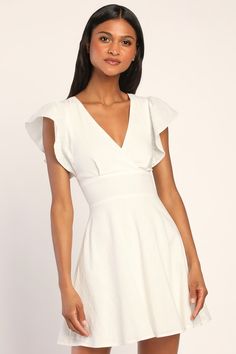 You'll be ready for any summer soiree with the Lulus Sweeten Me Up White Flutter Sleeve Mini Dress With Pockets! This flirty dress has a cotton-blend composition, that shapes a surplice neckline, flutter short sleeves, and two tying straps that come together at the back. The fitted, banded waist sits atop a breezy skater skirt that boasts side seam pockets and ends at a mini hem. Fabric: Fabric has no stretch. Front of bodice and skirt is lined. Shell: 100% Cotton. Lining: 100% Rayon. Hand Wash Elegant Flutter Sleeve Midi Dress For Beach, Elegant Beach Midi Dress With Flutter Sleeves, Fitted V-neck Linen Sundress, Chic Short Sleeve Linen Mini Dress, Linen V-neck Party Dress, Elegant Summer Linen Dress With Ruffles, Chic Linen Mini Dress With Short Sleeves, Chic Flutter Sleeve Mini Dress For Brunch, Summer Midi Dress With Butterfly Sleeves For Party