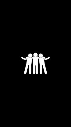 three people standing together in the dark with their arms around each other and one person holding his hands out