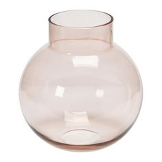 a glass vase with no lid on a white background