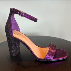 New In Box! Dazzling Purple Crystal Sandals With Extra Crystals Included! Size 7.5 Purple Glitter Heels, Dark Purple Prom Shoes, Dark Purple Heels Wedding, Black And Purple Heels, Purple Block Heel Shoes For Night Out, Purple Block Heel Heels For Night Out, Glamorous Purple Block Heel Shoes, Glamorous Purple Block Heel Heels, Purple Synthetic Heels For Evening