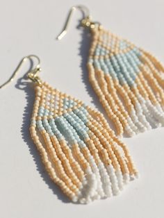 Classic beaded drape earrings with minimalist desert vibes 🏜️ Fair trade Handcrafted in India Glass beads Hypoallergenic & nickel free Measures 2.75" in length Adjustable Beaded Earrings With Dangling Beads For Everyday, Bohemian Earrings With Dangling Beads For Everyday, Summer Beaded Chain Dangle Earrings, Trendy Adjustable Beaded Earrings With Dangling Beads, Bohemian Everyday Earrings With Dangling Beads, Trendy Tiny Beads Earrings For Summer, Summer Beaded Jewelry For Everyday, Summer Beaded Everyday Jewelry, Everyday Summer Beaded Jewelry