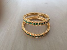 *This is Gold Finish Kundan Bangles Pair.Its Perfect for Wedding Occasion as well as Unique and Ethnic Traditional Bangle to gift and Also Bridal wear to match with Wedding Outfits. *Its made from Silver n Copper mix material and 100% Handmade. *Its available in Various Sizes like 2,2.2,2.4,2.6 Etc *Its open able Screwed Bangles Pair. *All Kundan stones set with silver foils handsetting method and long last guarantee of its workmanship.It is White Kundan Stones like pictures. *Also Available in Green Bangle Bracelets For Wedding, Adjustable Green Bangle For Wedding, Adjustable Green Wedding Bangle, Green Bracelet Jewelry For Wedding, Green Wedding Bracelet Jewelry, Green Bracelets For Wedding And Festive Occasions, Festive Green Bracelets For Wedding, Green Wedding Bracelets With Intricate Design, Green Wedding Bracelets For Festive Occasions